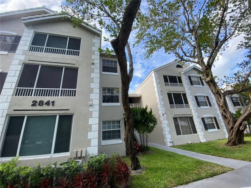 Photo of 2841 N Oakland Forest Drive #107, Oakland Park, FL 33309 (MLS # B26028116)