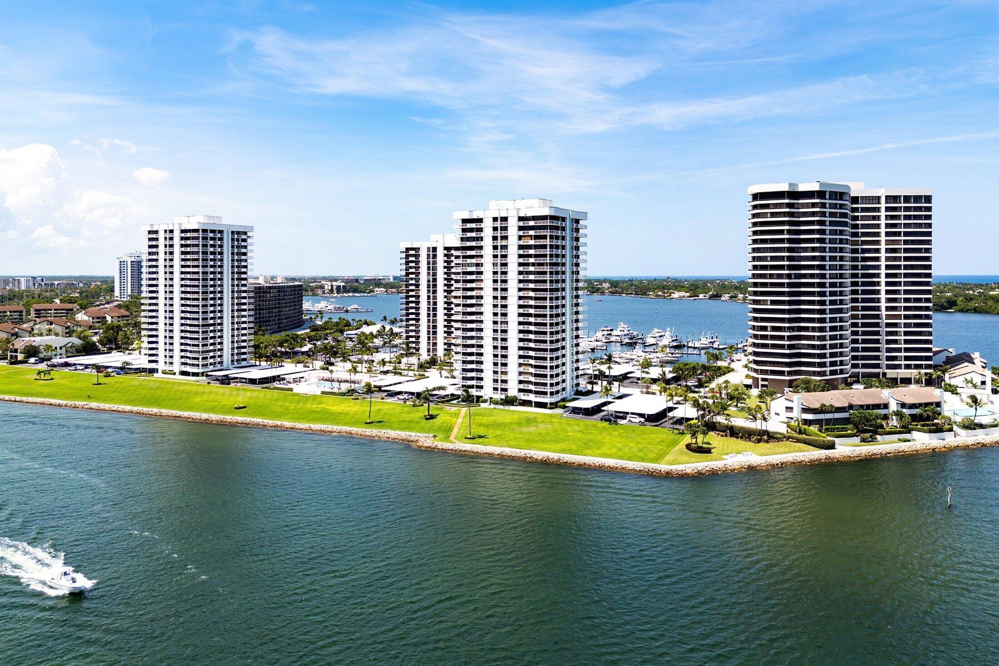 Sunlight and great views will greet you around every corner of this move-in ready, fully-renovated, 3 bedroom, 2.5 bath, 2500 sq.ft. East Cove Tower condo in the gated community of Old Port Cove. With only 4 residences on a floor, this spacious sixth-floor unit features an open modern kitchen, large living room, separate dining room, and floor-to-ceiling impact windows (with electric shades).Enjoy the intracoastal view of the marina and boats going by from every room. The full walls of sliders reveal exquisite water views around every bend of the home. Beautiful and tasteful tile flooring compliments the entire living area. The spacious master suite stuns again with water views, two custom walk-in closets and dual vanities. The high-rise building has been updated with