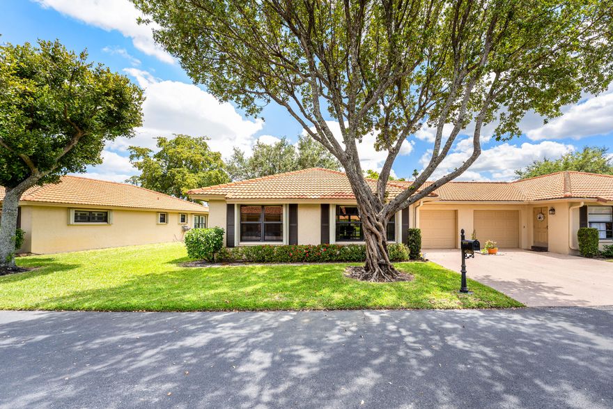 Welcome to Bent Tree Villas West in Boynton Beach! This fully remodeled 2-bedroom, 2-bath villa with a Florida room and 1-car garage is truly move-in ready. The updated kitchen features new cabinetry, granite countertops, and a stylish backsplash. Both bathrooms have been renovated, including a guest bath with a tiled walk-in shower, new vanities, and updated fixtures. Additional highlights include impact windows and a newer A/C. Can be purchased with furniture. The Florida room provides extra living space with peaceful garden views and no rear neighbors. Step outside to your private patio—perfect for relaxing or entertaining. Enjoy a vibrant, low-maintenance lifestyle with access to a saltwater pool, clubhouse, library, and a variety of social clubs and activities.  Association dues include water, basic cable, and exterior maintenance. Conveniently located near shopping, dining, entertainment, and top medical facilities. Don't miss this opportunity to enjoy comfortable, carefree living in a welcoming community!