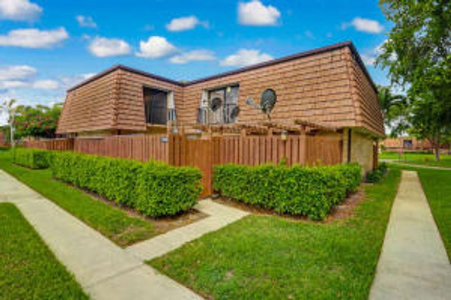 3 bedrooms/3 FULL baths, Spacious, Clean & Move-in Ready!  Freshly Painted interior, updated kitchen & baths, Newer A/C (in 2014 with 10 yr warranty), newer hot water heater, and ADT alarm System.  The courtyard is perfect for entertaining & BBQs, with a storage shed.  Kitchen features beautiful wood cabinets, tile counter-tops and dining area overlooking family room.  First floor has full bedroom and full bath, with 2 more spacious bedrooms & 2 baths upstairs, including front loader washer/dryer stack-ables.  Master suite has large walk-in closet with alpha organizers, dual vanity,updated cabinets & frameless glass shower doors.   Pet and Family Friendly, park-like neighborhood, well maintained with Clubhouse Pool, tennis and playground. All measurements approximate. easy access to I-95, Turnpike.  ONLY  6 MILES TO THE BEACHES!  MINUTES FROM THE WELLINGTON EQUESTRIAN GROUNDS, PUBLIC GOLF COURSES, WELLINGTON GREEN MALL AND THE PALM BEACH INT'L AIRPORT.  JUST 1 BLOCK AWAY FROM OKEEHELEE PARK WHERE YOU'LL FIND CHAMPIONSHIP WATERSKI COURSES, HORSEBACK RIDING TRAILS, BMX TRACKS, BALL FIELDS, PICNIC GROUNDS, PUBLIC GOLF, NATURE CENTER, BIKING/Walking Trails & lots more...
ALL Room measurements & MLS info are approximate and not guaranteed, buyer to verify