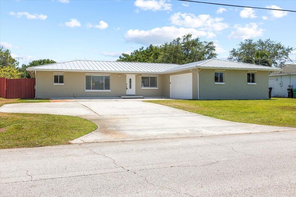 Photo of 129 NW Hibiscus Street, Port Saint Lucie, FL 34983 (MLS # R11086407)