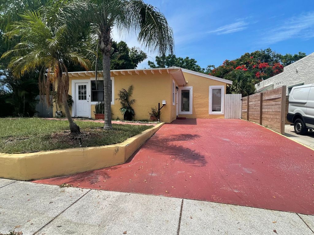 Photo of 719 Winters Street, West Palm Beach, FL 33405 (MLS # R10812844)