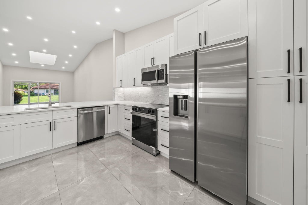 Photo of 6383 Pointe Pleasant Circle, Delray Beach, FL 33484 (MLS # R11023667)