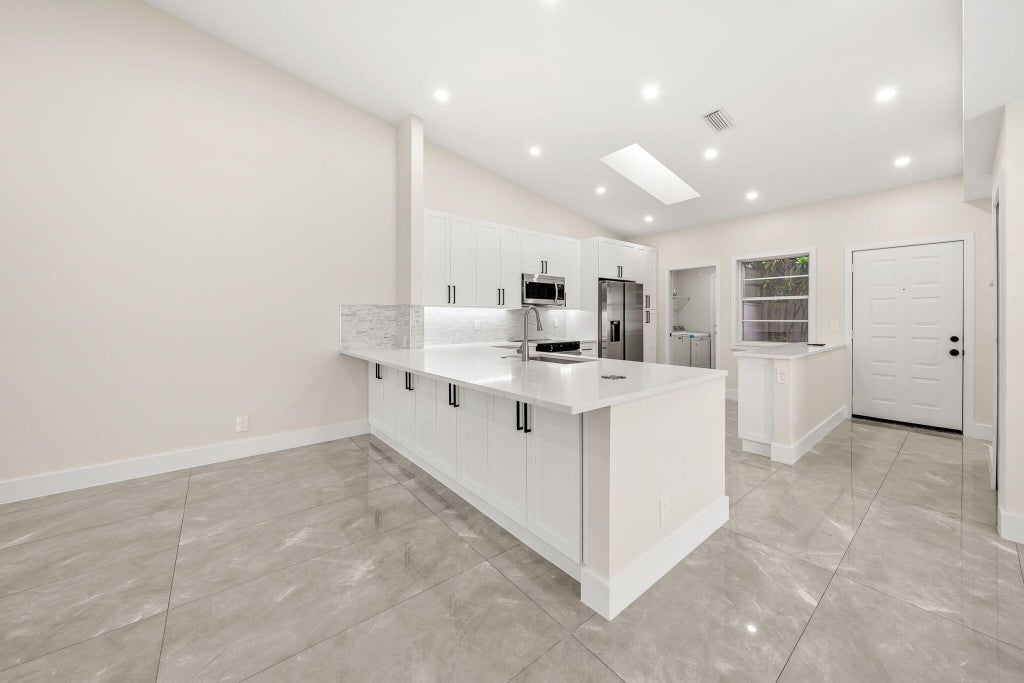 Photo of 6383 Pointe Pleasant Circle, Delray Beach, FL 33484 (MLS # R11023667)