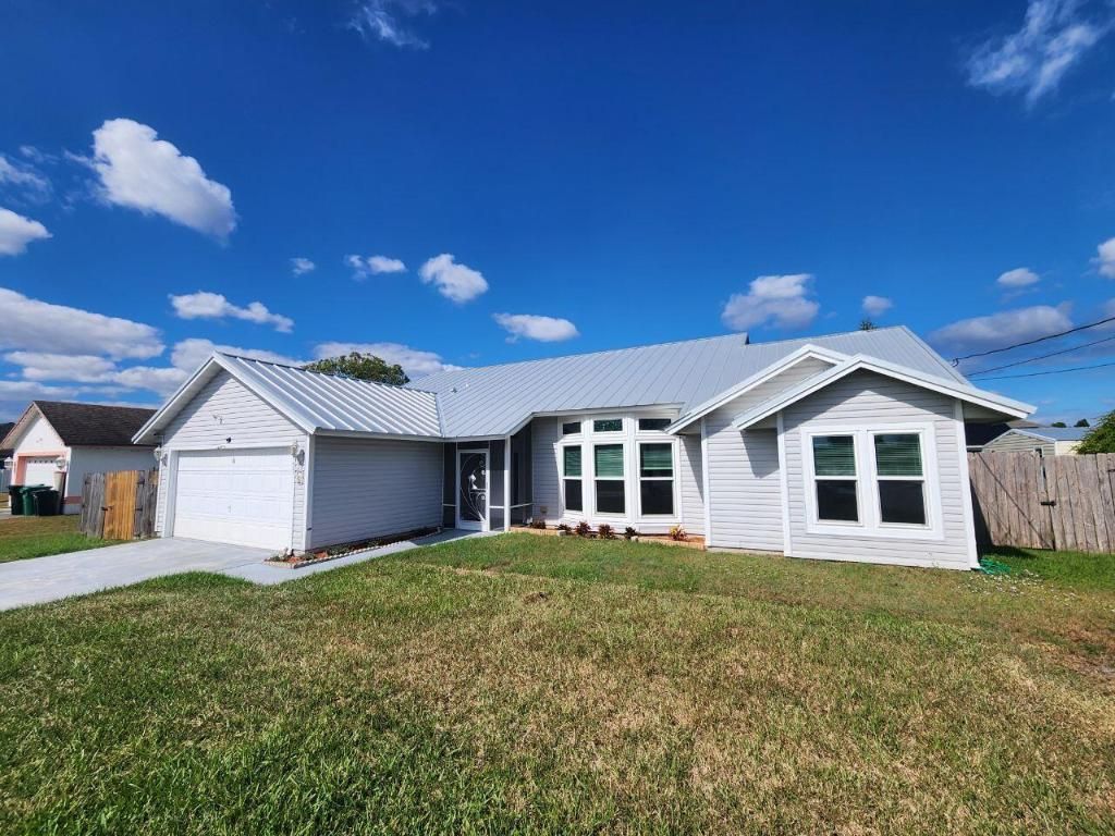 Photo of 733 SW Acapulco Terrace, Port Saint Lucie, FL 34953 (MLS # R11130464)
