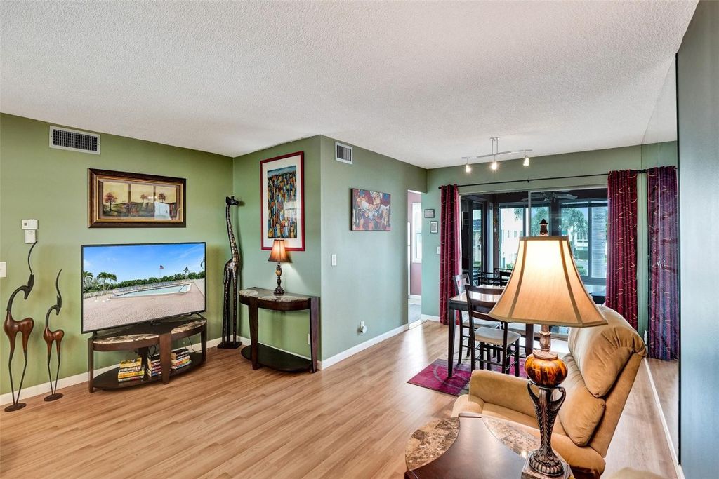 Photo of 32 Colonial Club Drive #202, Boynton Beach, FL 33435 (MLS # F10466340)