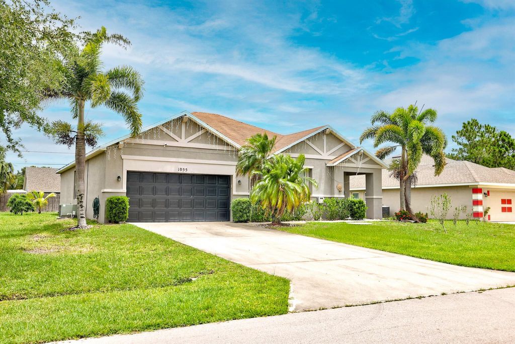 Photo of 1055 SW Hamrock Avenue, Port St Lucie, FL 34953 (MLS # R10893810)