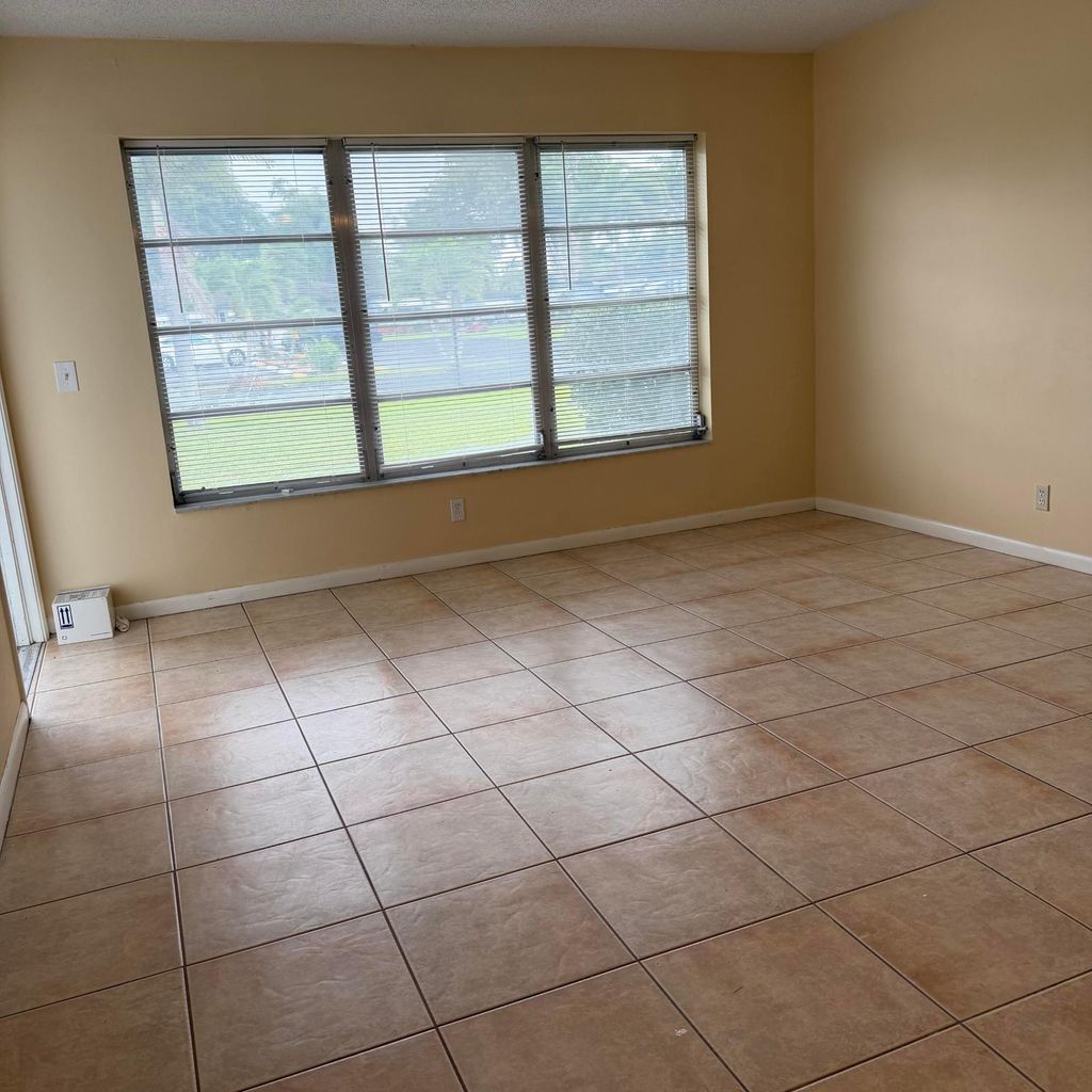 Photo of 707 High Point Boulevard N #Unit C, Delray Beach, FL 33445 (MLS # B26027245)