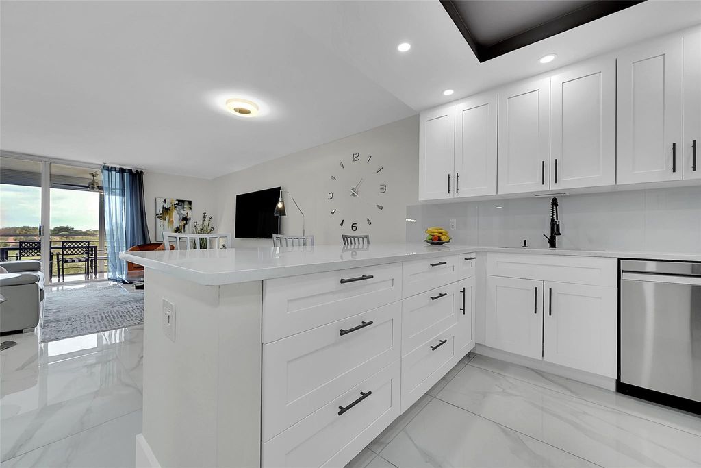 Photo of 3980 Oaks Clubhouse Drive #505, Pompano Beach, FL 33069 (MLS # F10538777)
