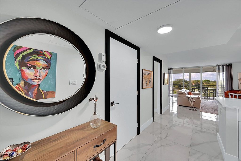 Photo of 3980 Oaks Clubhouse Drive #505, Pompano Beach, FL 33069 (MLS # F10538777)