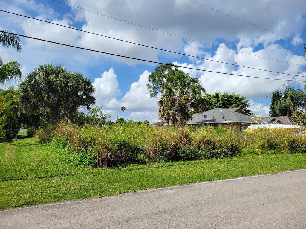 Photo of 1690 SW Lexington Drive SW, Port Saint Lucie, FL 34953 (MLS # R10784608)