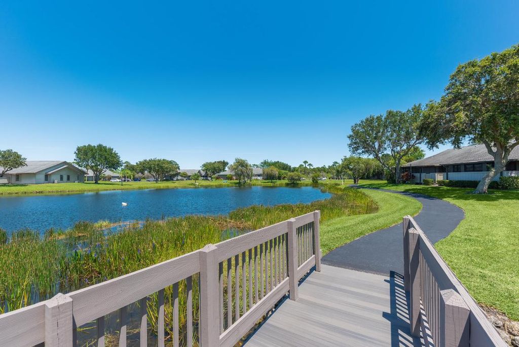 Photo of 3927 NW Cinnamon Tree Circle, Jensen Beach, FL 34957 (MLS # R10993660)