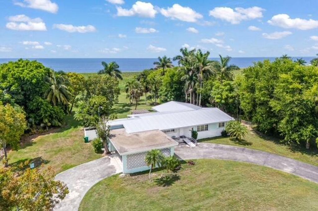 Photo of 1531 Bacom Point Road, Pahokee, FL 33476 (MLS # R11060396)