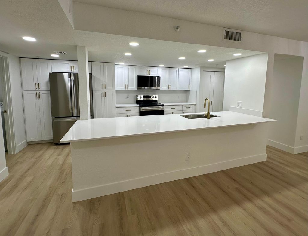 Photo of 950 Lavers Circle #F405, Delray Beach, FL 33444 (MLS # R11166486)