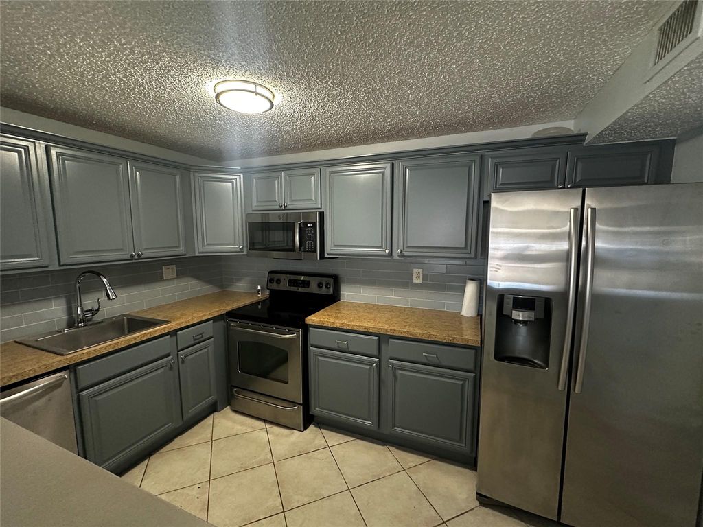 Photo of 4115 NW 88th Avenue #106, Coral Springs, FL 33065 (MLS # F10493336)