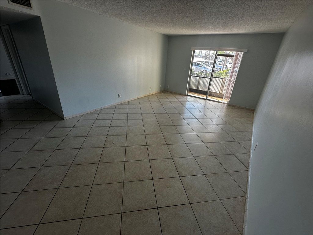 Photo of 4115 NW 88th Avenue #106, Coral Springs, FL 33065 (MLS # F10493336)