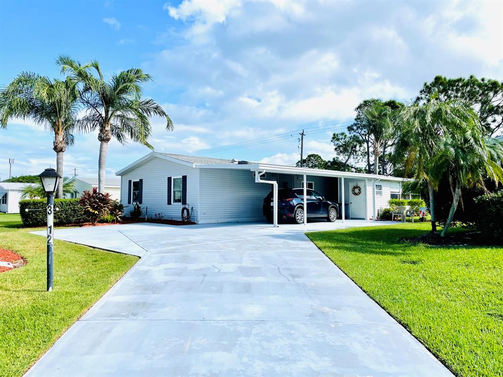 Photo of 3812 Crabapple Drive, Port Saint Lucie, FL 34952 (MLS # R10753955)