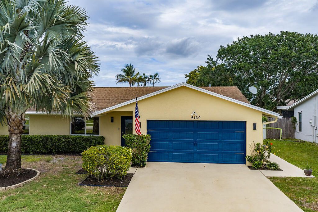 Photo of 6160 Silver Oak Drive, Lake Worth, FL 33467 (MLS # B26018922)