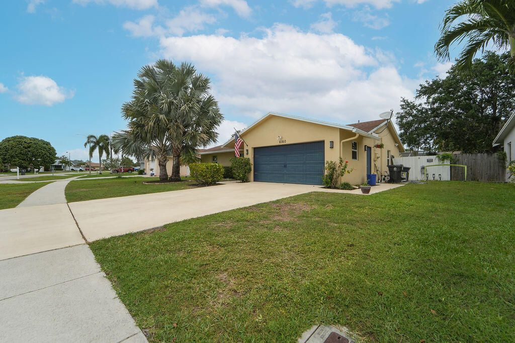 Photo of 6160 Silver Oak Drive, Lake Worth, FL 33467 (MLS # B26018922)