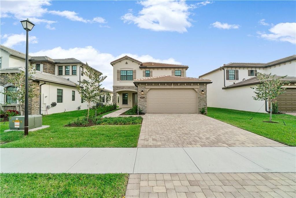 Photo of 8755 Grand Prix Lane, Boynton Beach, FL 33472 (MLS # F10548750)