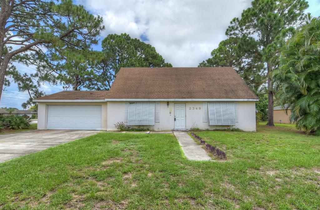 Photo of 2349 SE Shipping Road, Port Saint Lucie, FL 34952 (MLS # R10727492)