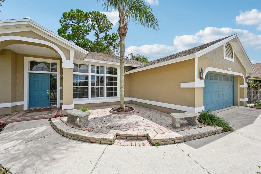 Photo of 160 Royal Pine Circle S, Royal Palm Beach, FL 33411 (MLS # B26025855)