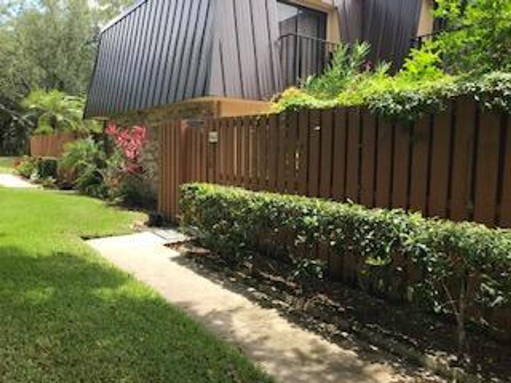 Photo of 6447 SE Windsong Lane, Stuart, FL 34997 (MLS # R10723118)