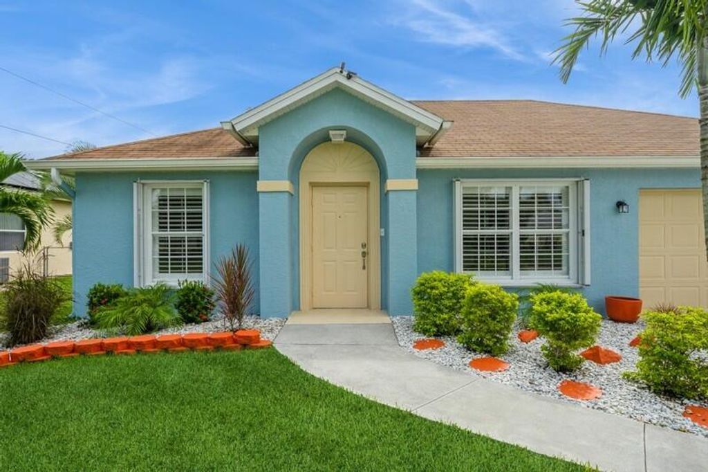 Photo of 165 NW Peach Street, Port Saint Lucie, FL 34983 (MLS # R11046424)