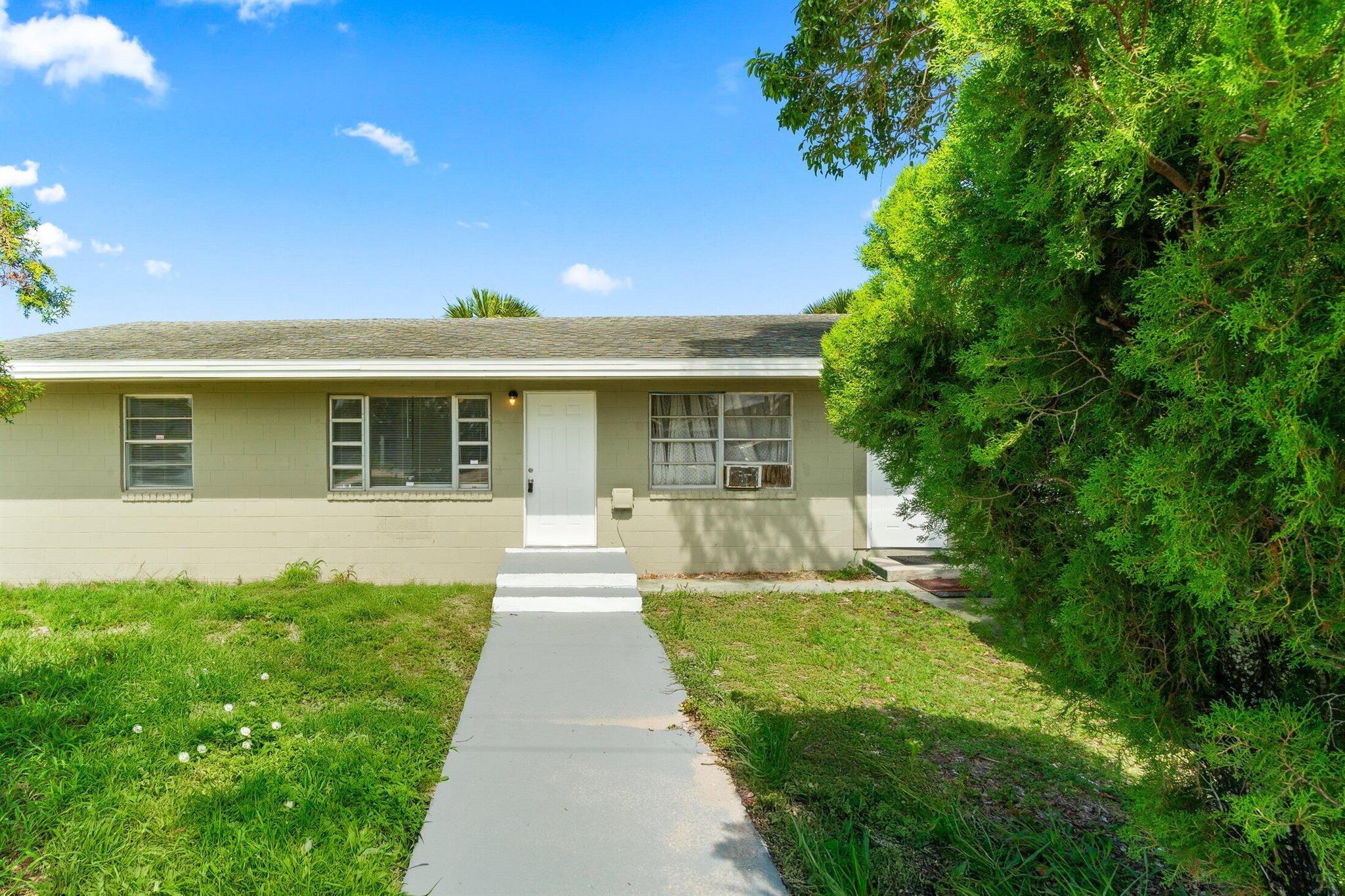 Renovated 2/1 with new updated kitchen and bathrooms. New flooring throughout.