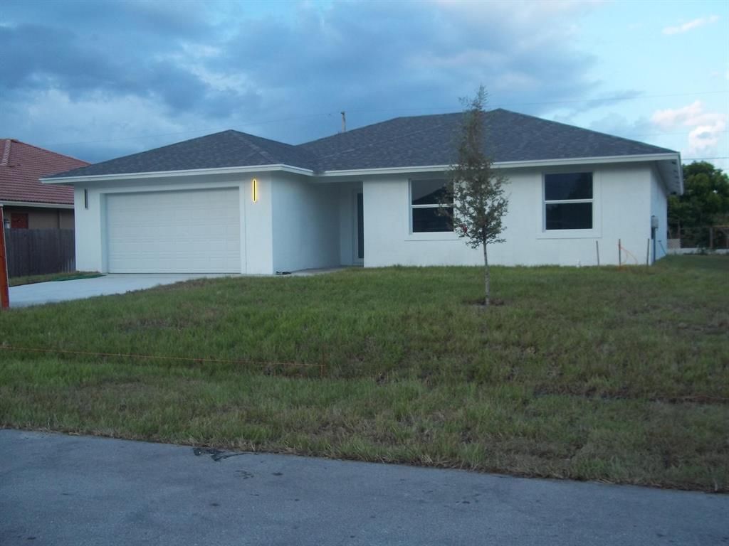 Photo of 4171 SW Spickler Street, Port Saint Lucie, FL 34953 (MLS # R10825543)
