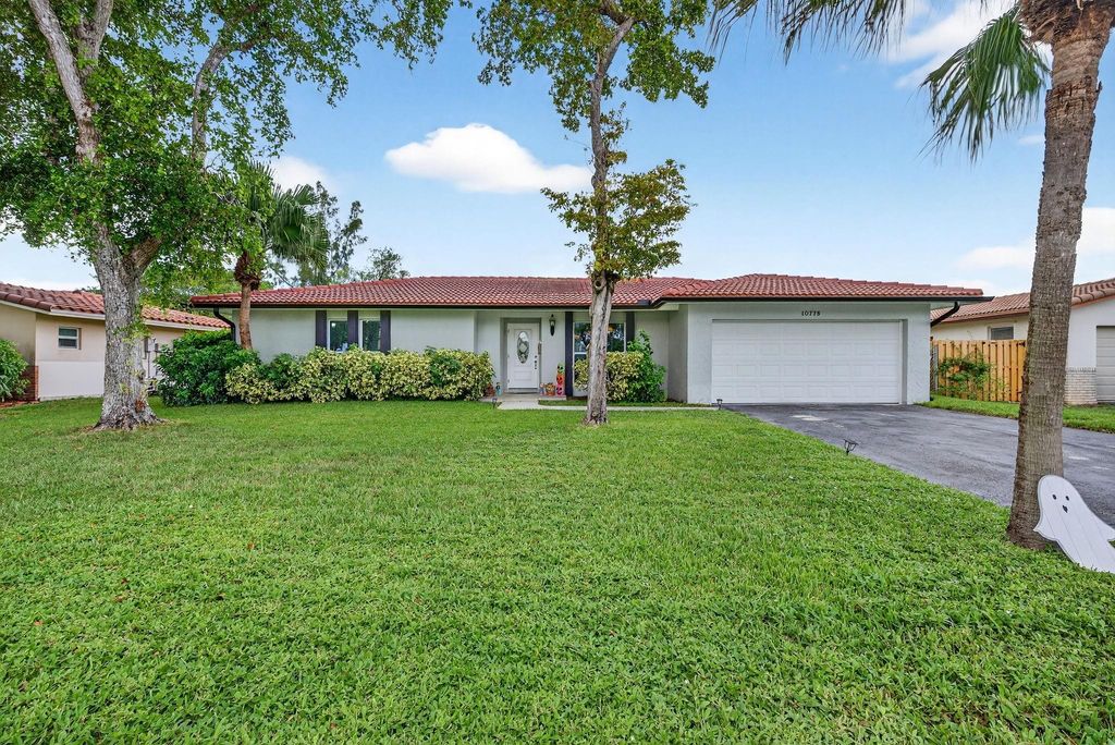 Photo of 10775 NW 40th St, Coral Springs, FL 33065 (MLS # F10533065)