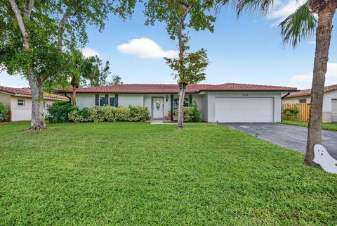 Photo of 10775 NW 40th St, Coral Springs, FL 33065 (MLS # F10533065)