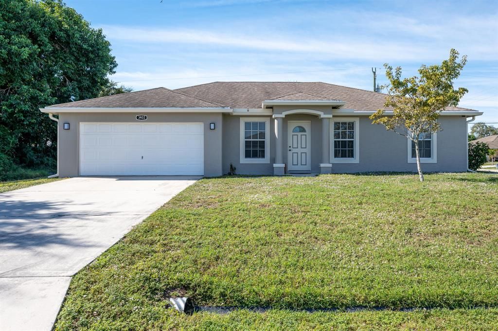 Photo of 3402 SW Princeton Street, Port Saint Lucie, FL 34953 (MLS # R10763501)