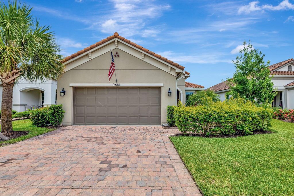 Photo of 9584 SW Royal Poinciana Drive, Port Saint Lucie, FL 34987 (MLS # R11146582)