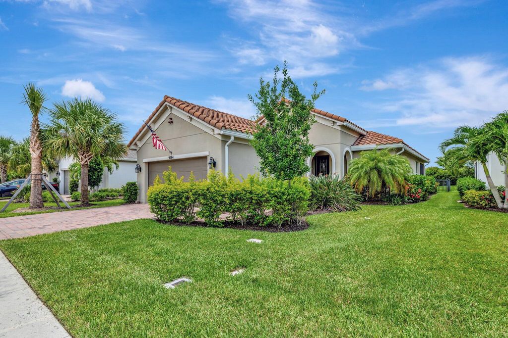 Photo of 9584 SW Royal Poinciana Drive, Port Saint Lucie, FL 34987 (MLS # R11146582)