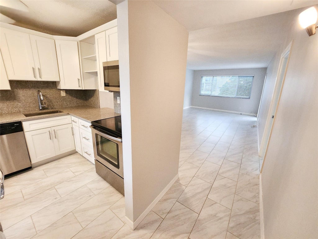 Photo of 2300 PARK Lane #216, Hollywood, FL 33021 (MLS # B26082898)