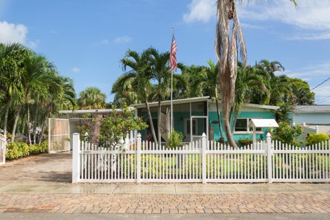 Photo of 665 NE Bernard Street, Jensen Beach, FL 34957 (MLS # B26072396)