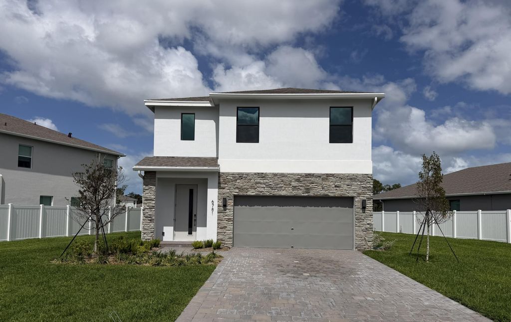 Photo of 6781 SE Park Trace Drive, Stuart, FL 34997 (MLS # B26016444)