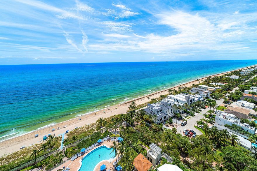Enjoy breathtaking ocean views from this High Floor beautifully and updated 3 bedroom residence (third bedroom open den). The private elevator opens directly into the unit, leading to an absolutely gorgeous new kitchen with a large island and high end appliances, new wood flooring, and elegantly renovated bathrooms. The Master Bedroom is on the Ocean Side so you can wake up to stunning Sunrises. The expansive wraparound balcony showcases endless ocean and beach views overlooking the resort-style pools. Features Include two garage parking spaces plus valet service. L'Hermitage offers over 10 acres of oceanfront luxury with a guard gate and 24/7 security, two pools, two spas, a poolside café with a monthly maintenance credit, fitness center, two clay tennis courts, and pet-friendly.