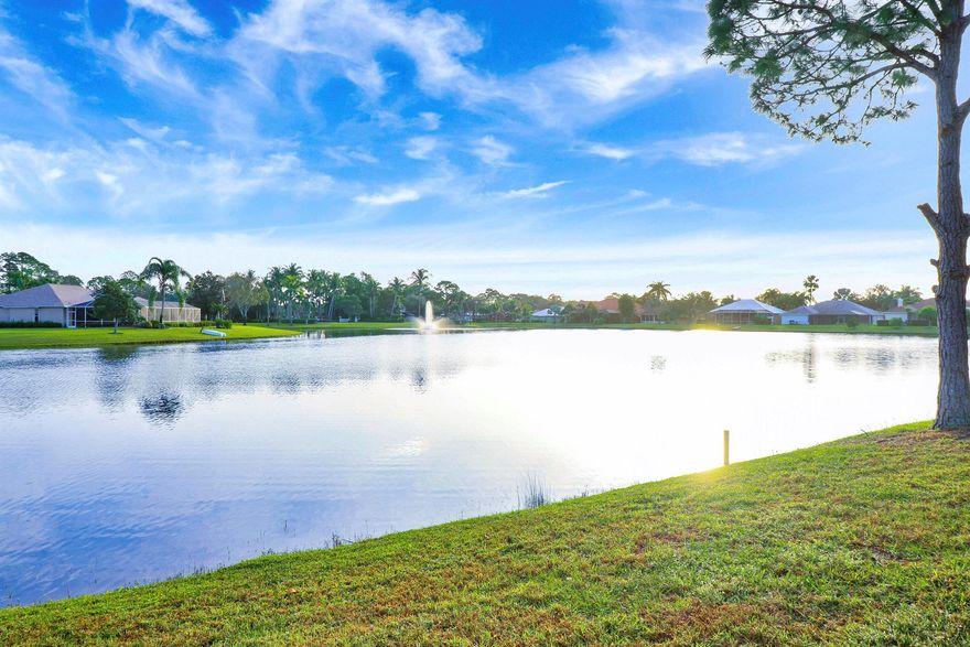This is lake living at its finest with a very large backyard. It's a fisherman's dream! The roof is new & the home is equipped with new accordion shutters. Sawgrass Lakes is a gated & quiet community & the home is situated on a cul-de-sac which provides peace & no cut through traffic. All new stainless steal kitchen appliances. The large screened in porch provides stunning views of the manicured & professionally landscaped yard plus the lake is stocked with fish. Your perfect life begins at this breath taking  home! Wifi and cable are free. Allowance for flooring replacement will be given. Come visit to see it's beauty for yourself!