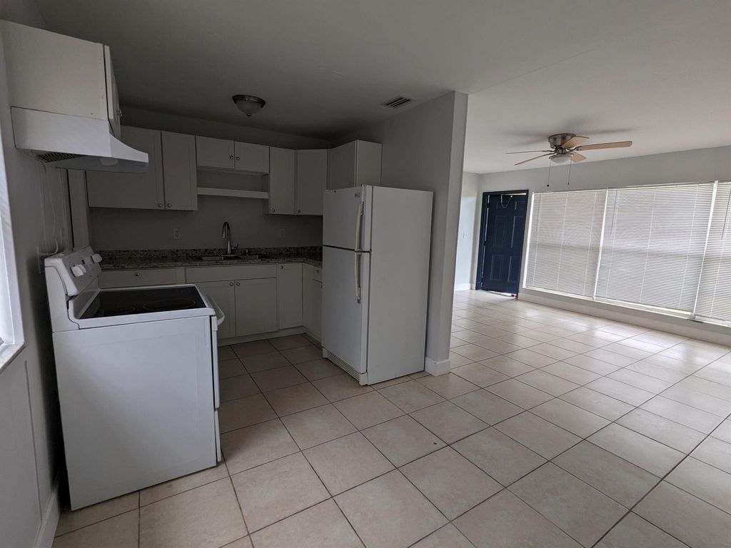 Photo of 33 Sioux Lane, Lantana, FL 33462 (MLS # R11092141)