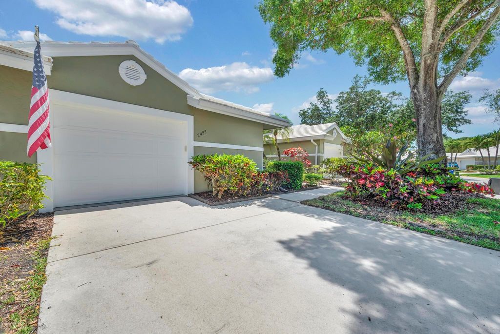 Photo of 2433 SW Foxpoint Trail, Palm City, FL 34990 (MLS # R11089359)