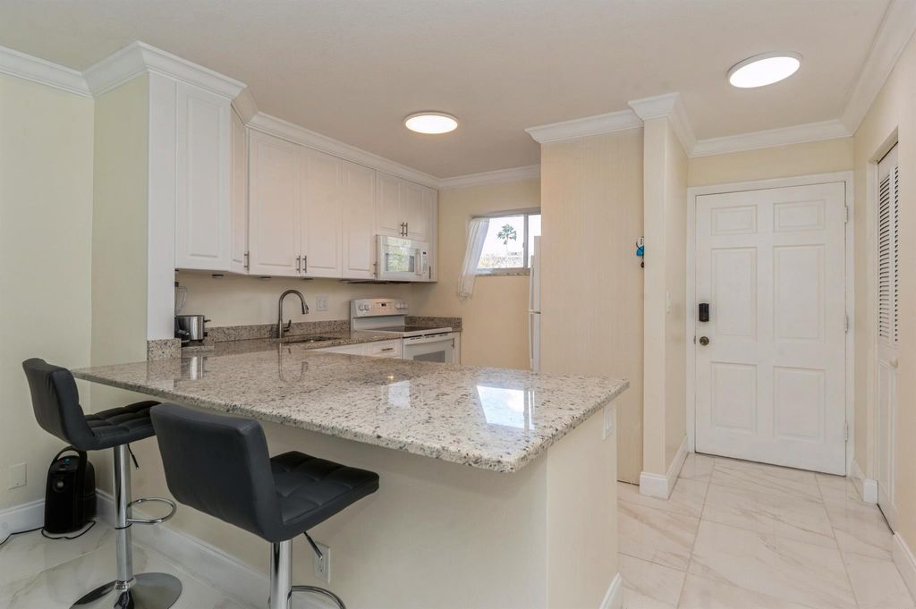 Photo of 2668 Garden Drive N #105, Lake Worth, FL 33461 (MLS # R11054287)