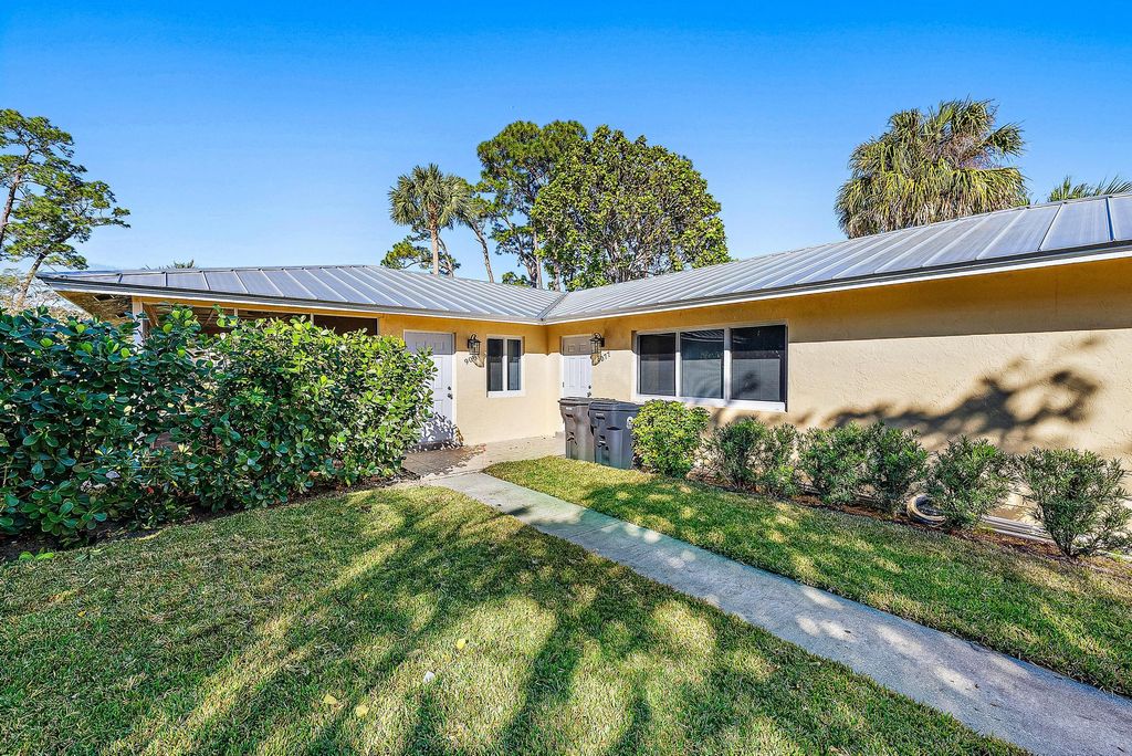 Photo of 9077 W Highland Pines Boulevard, Palm Beach Gardens, FL 33418 (MLS # R10957613)