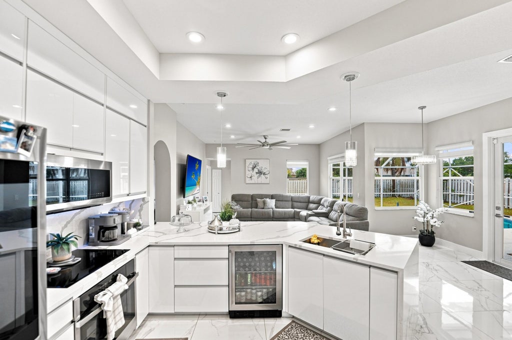 Photo of 470 SW McComb Avenue, Port Saint Lucie, FL 34953 (MLS # B26065798)