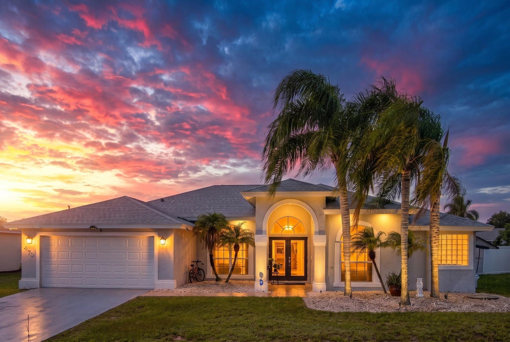 Photo of 470 SW McComb Avenue, Port Saint Lucie, FL 34953 (MLS # B26065798)