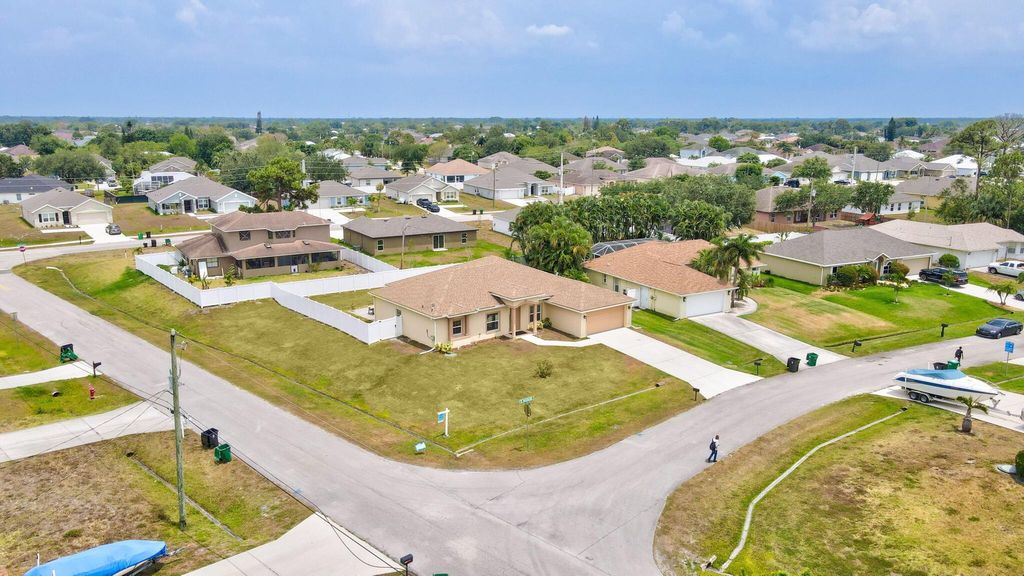 Photo of 4201 SW Mcclellen Street, Port Saint Lucie, FL 34953 (MLS # R10983105)