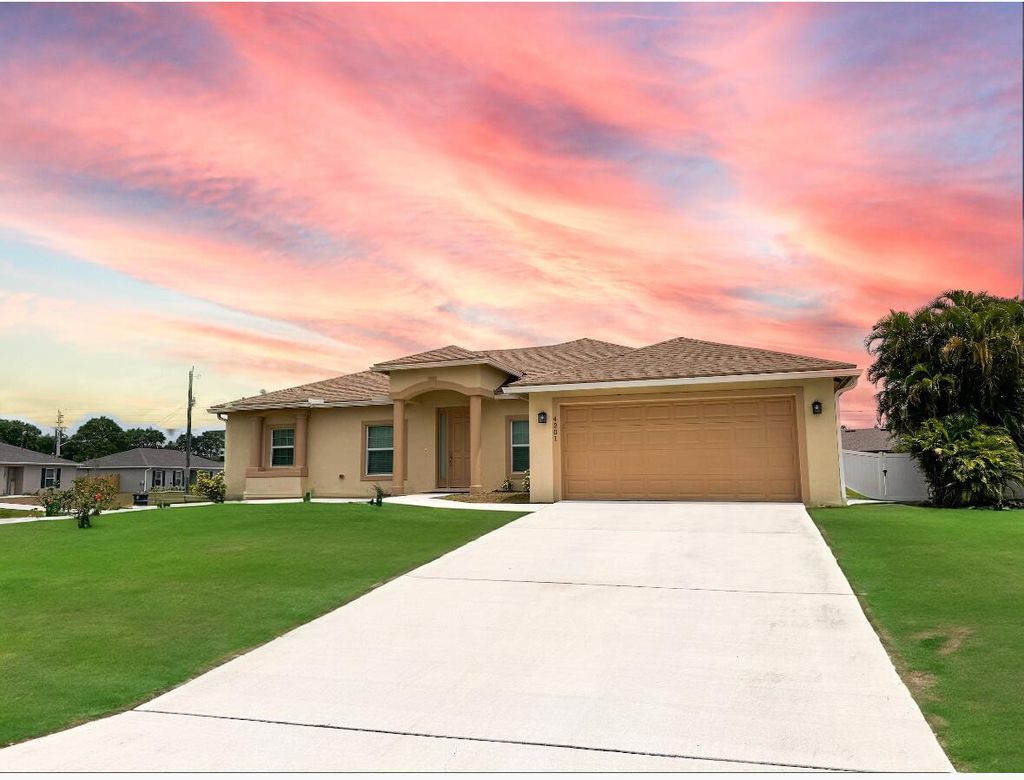 Photo of 4201 SW Mcclellen Street, Port Saint Lucie, FL 34953 (MLS # R10983105)