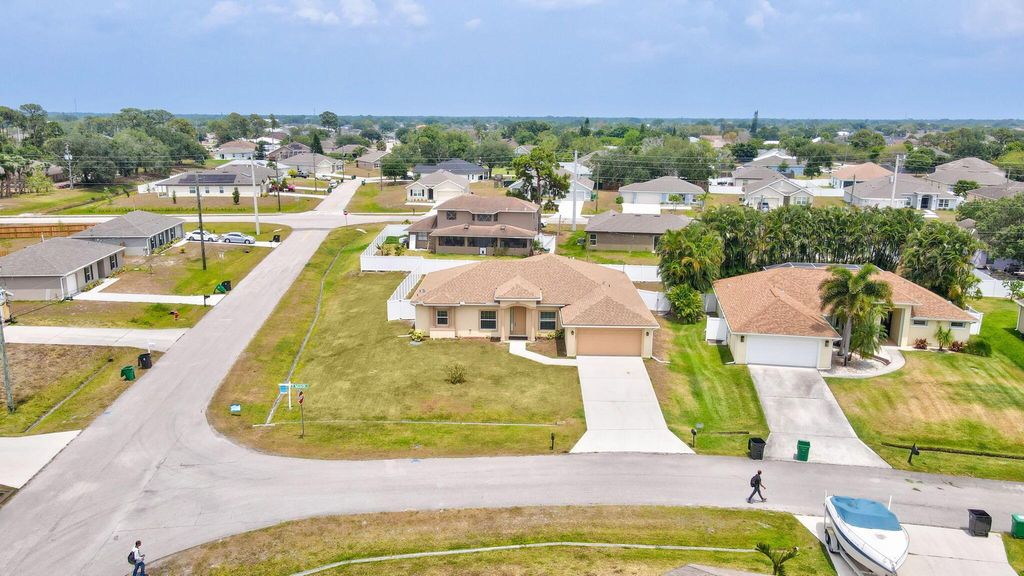 Photo of 4201 SW Mcclellen Street, Port Saint Lucie, FL 34953 (MLS # R10983105)