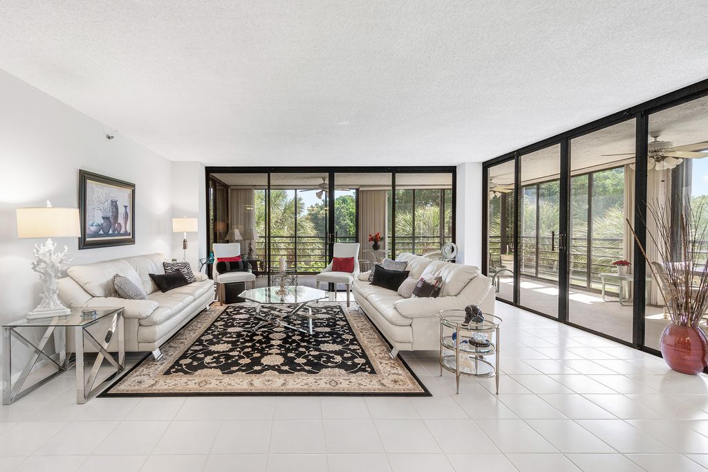 Photo of 7572 Regency Lake Drive #401, Boca Raton, FL 33433 (MLS # R11130039)